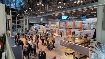 People visiting NRF event booths